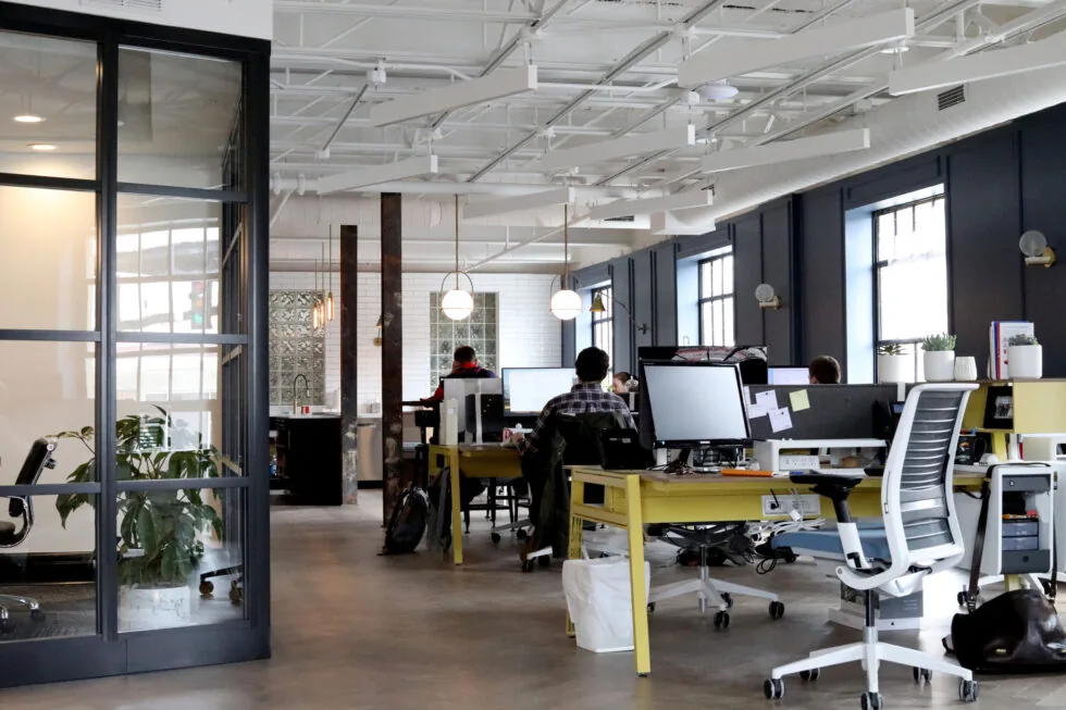 People working in a bright, open office